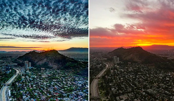 Imagem de uma cidade durante o entardecer, mostrando um céu dramático com nuvens coloridas e uma vista panorâmica do horizonte, destacando o contraste entre o dia e a noite.