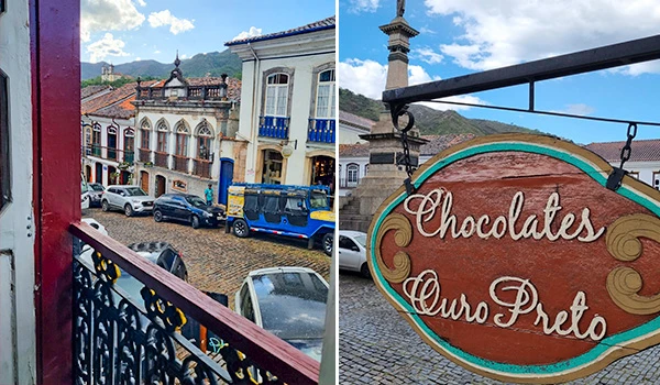Rua de paralelepípedo com prédios históricos coloridos, carros estacionados e uma loja de chocolates chamada 'Chocolates Ouro Preto', em uma cidade charmosa de Minas Gerais, Brasil.