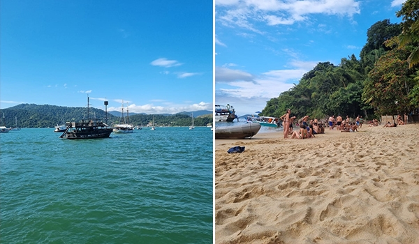 Praia com barcos e pessoas curtindo o dia de sol, cercada por natureza e água cristalina, perfeita para descanso e lazer em meio à natureza.