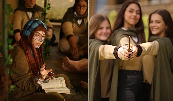 Grupo de jovens brincando com uma varinha mágica em um ambiente de fantasia, parecem estar participando de uma atividade com roupas temáticas e expressões divertidas. Harry Potter em Campos do Jordão.