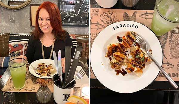 Deusa Rodrigues vestindo roupa preta, apreciando uma refeição no restaurante Paradiso