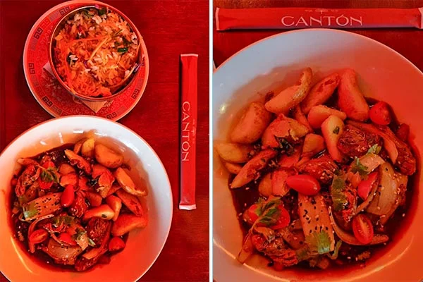 Foto de dois pratos de comida peruano-chinesa, com macarrão ou massa salteada, legumes, tomates-cereja, cebola, ervas e pedaços de proteína, acompanhados de um pequeno prato de arroz. A imagem tem iluminação avermelhada e utensílios com a marca “CANTON”. Peru Week.