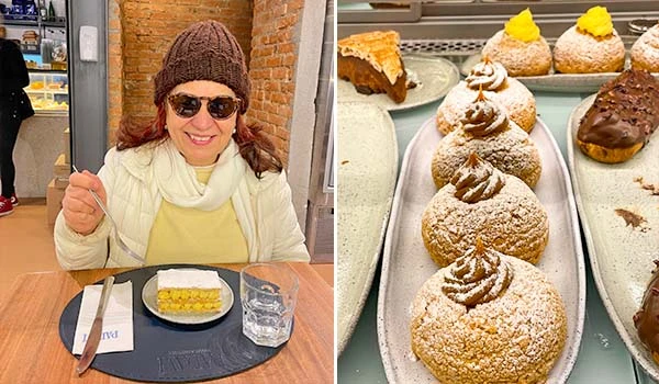 Deusa Rodrigues no restaurante, com sobremesa de torta de limão e uma variedade de doces amanteigados, incluindo profiteroles e brigadeiro, junto ao café.