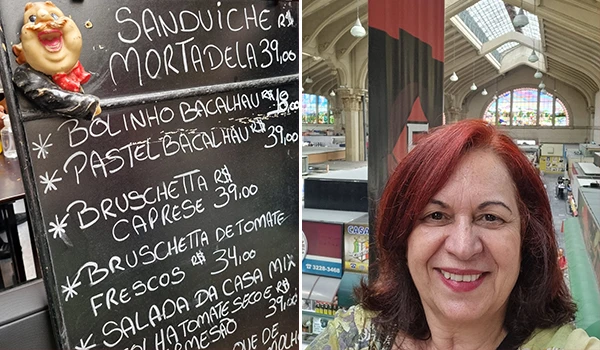 Deusa Rodrigues em ambiente do Mercadão de São Paulo com destaque para o quadro de cardápio de sanduíches de mortadela, bacalhau, pastel, bruschetta, tomates e saladas.