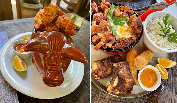 Deliciosos pratos típicos brasileiros em um restaurante, incluindo uma vasilha de barro criativa em forma de cabeça de boi no restaurante em Extrema.