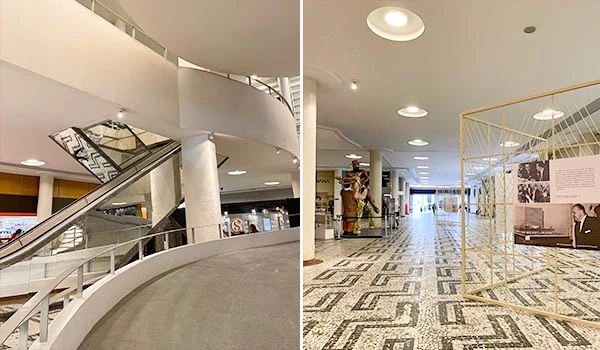 Interior moderno do museu com escadas rolantes e piso decorativo, exibindo arte e exibindo espaço com exposições. Dicas do Conjunto Nacional em São Paulo.