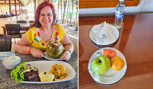 Deusa Rodrigues apreciando uma refeição com frutas, arroz, carne e salada em um restaurante ao ar livre, promovendo alimentação saudável e qualidade de vida.