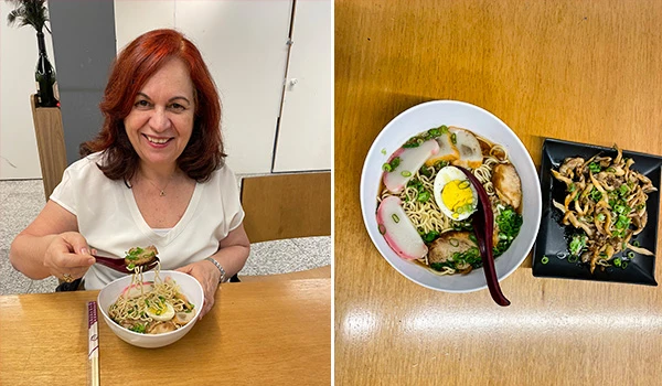 Deusa Rodrigues, apreciando um prato de ramen japonês com ingredientes frescos. Mercado de Santo Amaro restaurantes.