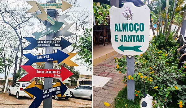 Placas de sinalização turística com indicações de cidades e distâncias, incluindo Paraty, Rio de Janeiro e Guaratinguetá. Ao lado, placa da pousada indicando almoço e jantar, cercada por flores e vegetação tropical.