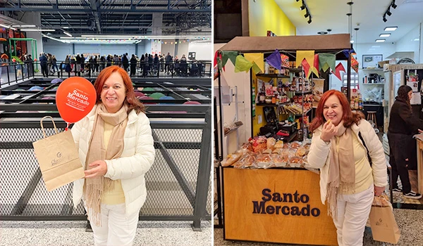 Deusa Rodrigues segurando uma sacola de compras e um balão do Santo Mercado, em ambiente de shopping ou feira.
