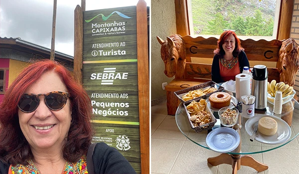 Deusa Rodrigues sorridente em Montanhas Capixabas, com uma mesa repleta de comidas típicas e um ambiente acolhedor ao fundo.