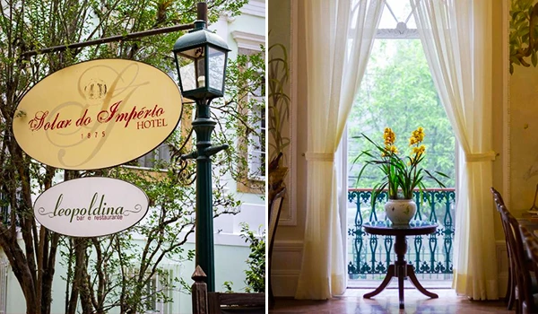 Imagem do exterior de um hotel chamado Solar do Imperador com um letreiro elegante e árvores ao redor, e uma varanda com cortinas brancas e uma planta em vaso na imagem ao lado. Perfeito para quem busca hospedagem confortável e encantadora em um ambiente com decoração clássica.