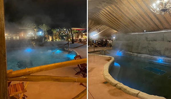 Imagem de uma piscina aquecida em ambiente interno e externo, ideal para relaxar e aproveitar momentos de lazer, com iluminação aconchegante. Vila Viking e o “Quarto do Rei”.