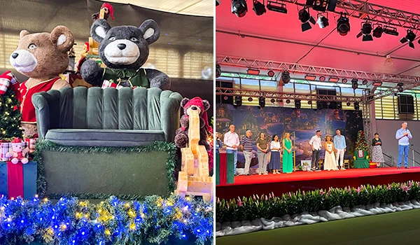 Decoração de Natal com ursinhos de pelúcia e palco de evento com pessoas na celebração natalina