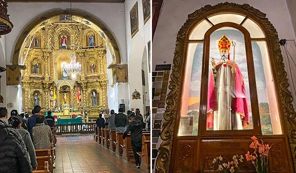 Fotografia em duas partes do interior de uma igreja católica. À esquerda, fiéis acompanham uma celebração diante de um altar-mor dourado, ricamente ornamentado com imagens de santos, colunas e detalhes entalhados. À direita, uma imagem de um bispo com vestes brancas, capa vermelha e mitra está exposta em um nicho de madeira entalhada, decorado com flores na base.