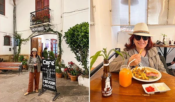 Deusa Rodrigues usando chapéu de palha e óculos escuros posa em frente ao Café Mirador San Miguel, em uma charmosa praça de Sucre, na Bolívia. Na imagem ao lado, ela aparece sentada à mesa do café, saboreando uma refeição com batatas fritas e sanduíche, acompanhada de suco de laranja, em um ambiente acolhedor e decorado com plantas.